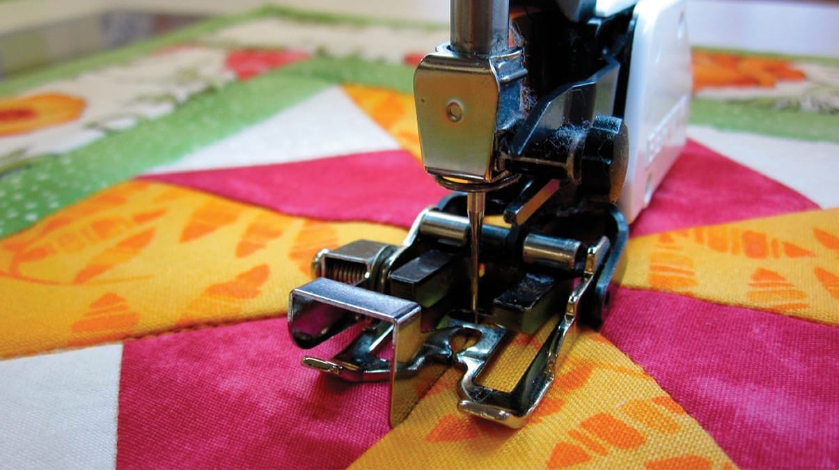 Accessory of the month, 25% off BERNINA Three-Sole Walking Foot with Seam Guide #50.